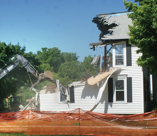 Fire-ravaged historic home is demolished